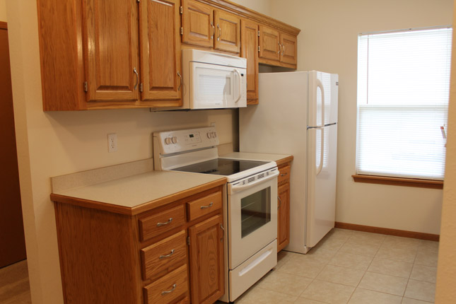 Kitchen area inside a Blue Branch Manor home
