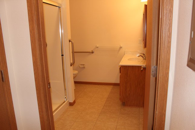 Bathroom area inside a Blue Branch Manor home